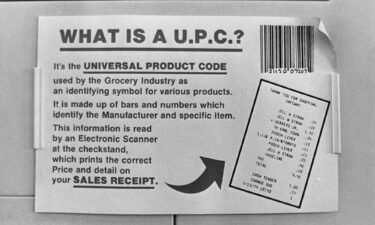 A sign from 1980 introduces the UPC to shoppers at a supermarket checkout in Aurora