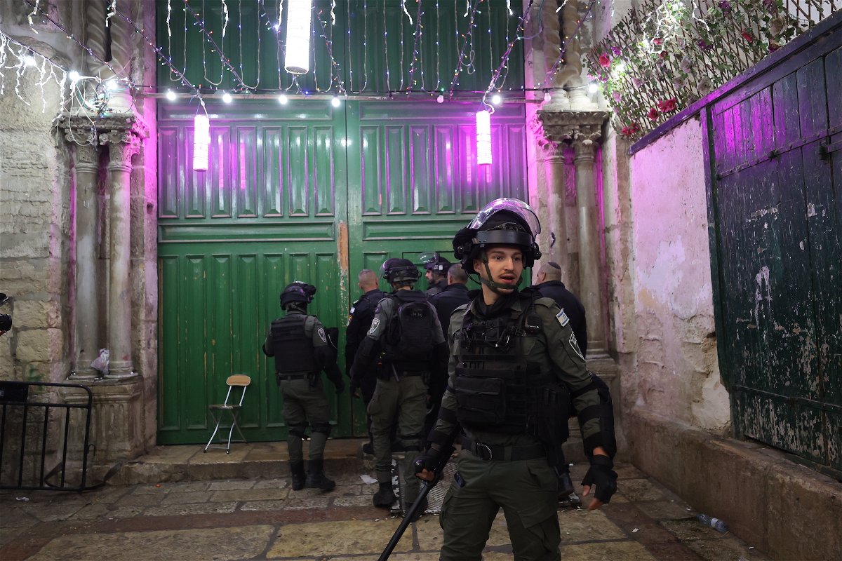Israeli police enter the al-Aqsa mosque in Jerusalem on April 4