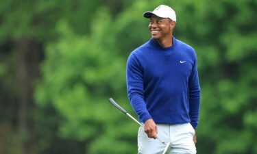 Woods was all smiles during his practice round.