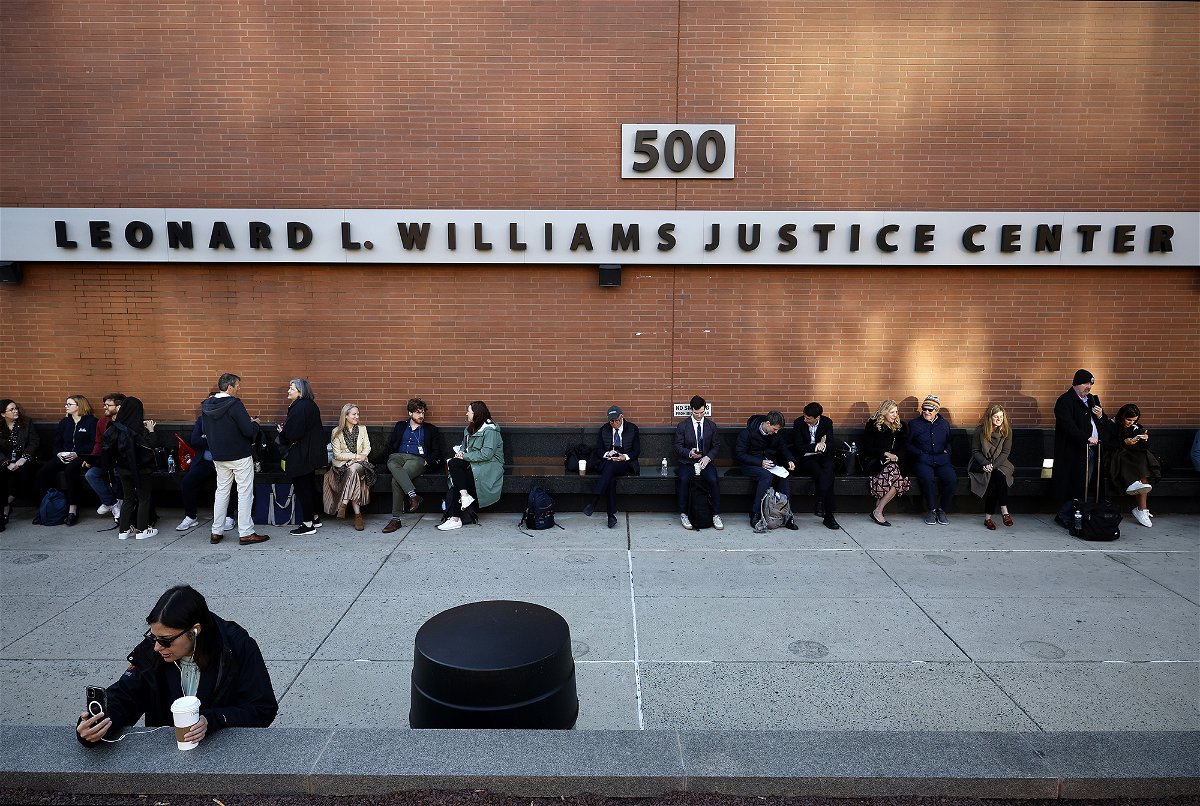 WILMINGTON, DELAWARE - APRIL 18: Reporters and members of the public line up early to enter the Leonard Williams Justice Center where Dominion Voting Systems is suing FOX News in Delaware Superior Court on April 18, 2023 in Wilmington, Delaware. Dominion is seeking $1.6 billion in damages because it claims it was defamed by FOX when the cable network broadcast false claims that it was tied to late Venezuelan President Hugo Chavez, that it paid kickbacks to politicians and that its voting machines were 'rigged' and switched millions of votes from Donald Trump to Joe Biden in the 2020 election.  