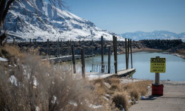 A sign warns boaters of low lake levels at a Great Salt Lake marina in Magna