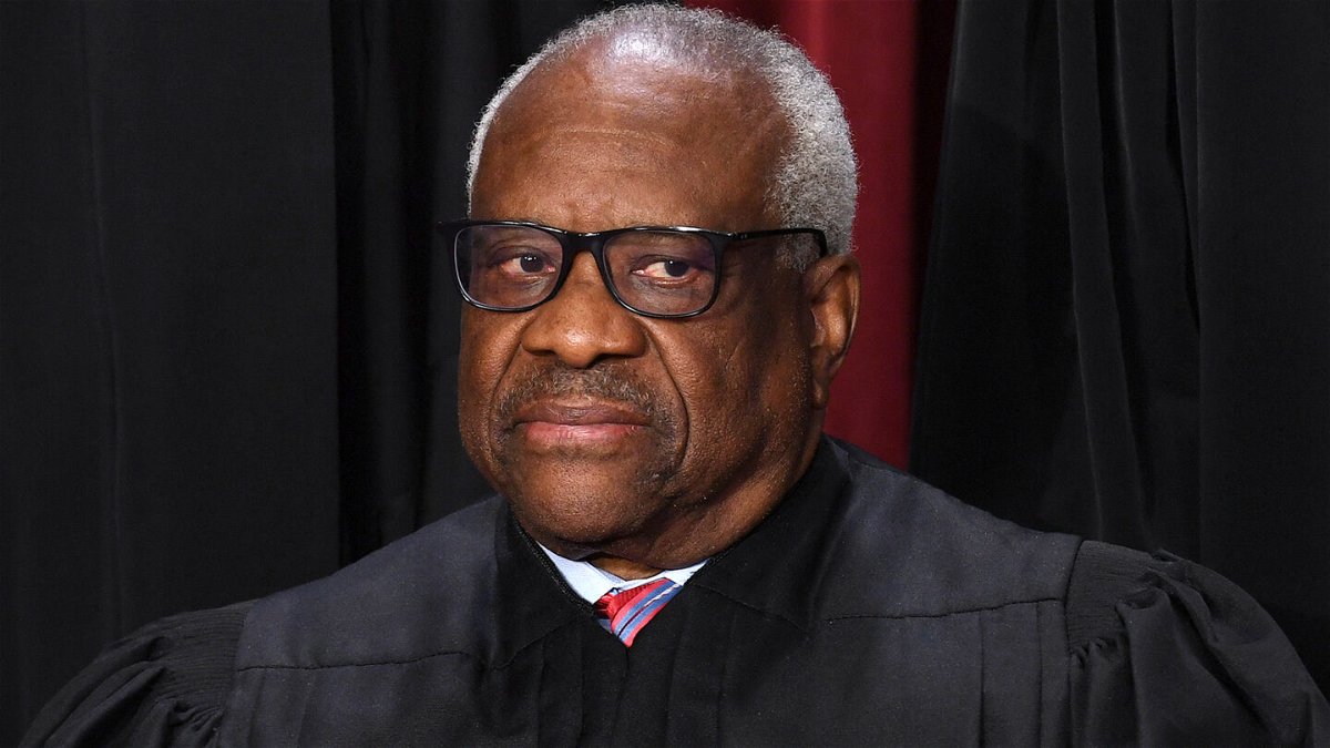 <i>Olivier Douliery/AFP/Getty Images</i><br/>Supreme Court Justice Clarence Thomas said Friday that he did not disclose luxury travel paid for by a Republican donor because he was advised at the time that he did not have to report it.