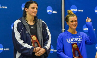 University of Pennsylvania swimmer Lia Thomas and Kentucky swimmer Riley Gaines react after finishing tied for 5th in the 200 freestyle finals at the NCAA Swimming and Diving Championships on March 18th