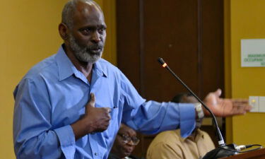 Crosley Green addresses an audience during a press conference at the Holiday Inn in Titusville