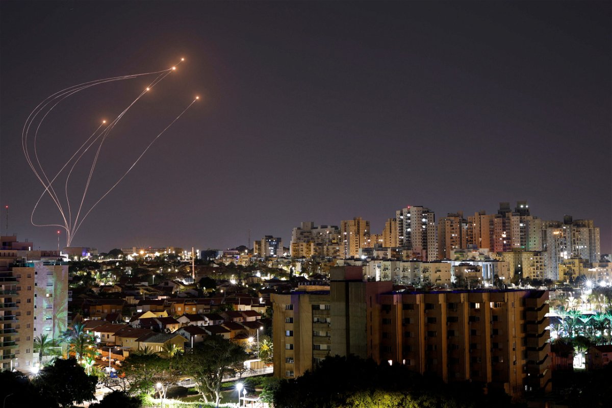 <i>Amir Cohen/Reuters</i><br/>Streaks of light are seen as Israel's Iron Dome anti-missile system intercept rockets launched from the Gaza Strip