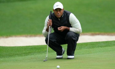 Tiger Woods lines up a putt on the 16th hole during the second round at Augusta.