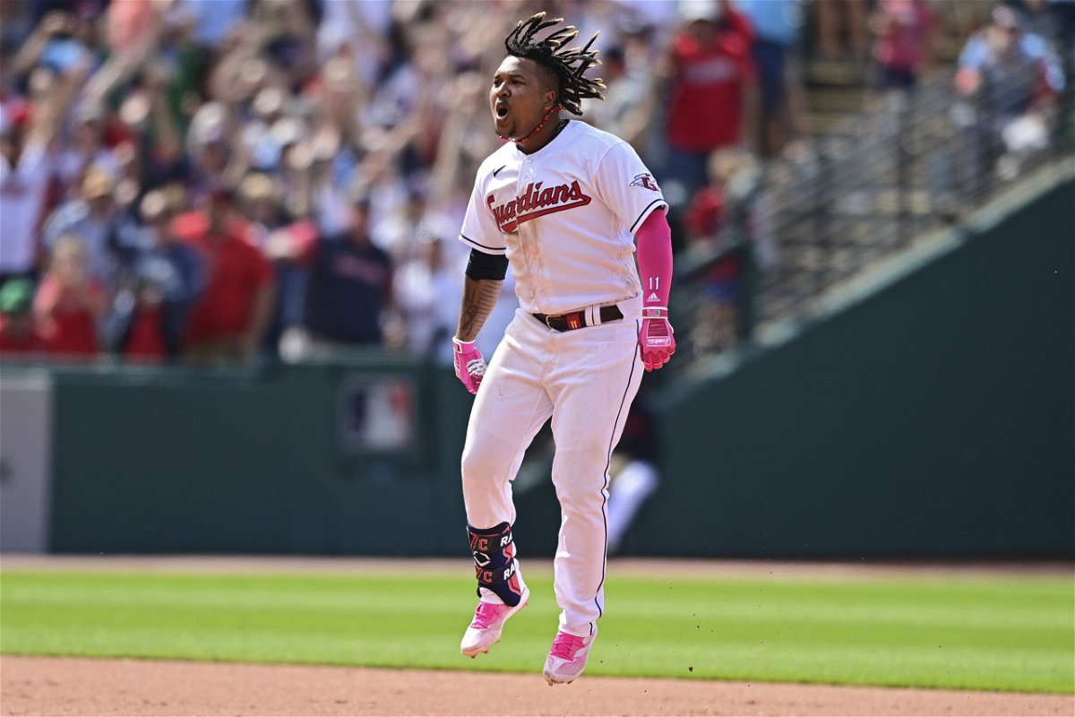 Cleveland Guardians' Jose Ramirez celebrates after hitting a game winning double off St. Louis Cardinals relief pitcher Ryan Helsley during the ninth inning of a baseball game, Sunday, May 28, 2023, in Cleveland.