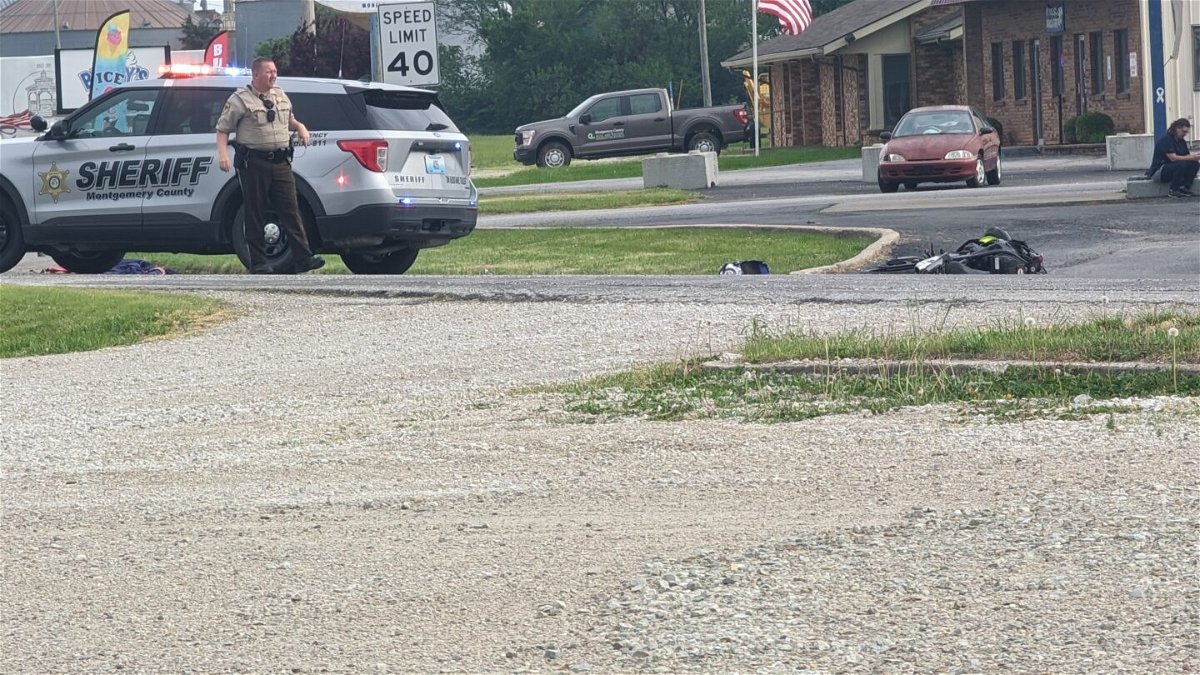 A Montgomery County sheriff's deputy works the scene of a motorcycle crash on S. Sturgeon Street in Montgomery City. The Missouri State Highway Patrol said it was investigating what happened in the crash.