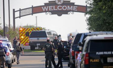 Emergency personnel work at the scene of the  shooting at Allen Premium Outlets on May 6 in Allen