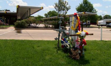 A makeshift memorial stands outside a Sonic restaurant in Keene