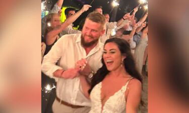 Aric and Samantha Hutchinson are seen in this image that has been partially blurred by CNN for privacy. Aric has filed a wrongful death lawsuit on May 17 against the alleged drunk driver accused of killing his wife.