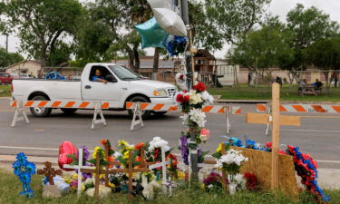 A memorial site set up after a deadly crash at a bus stop in Brownsville