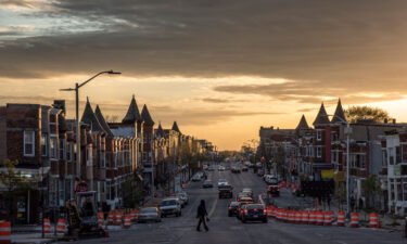The sun sets over W. North Avenue near where Freddie Gray lived in Baltimore on April 19