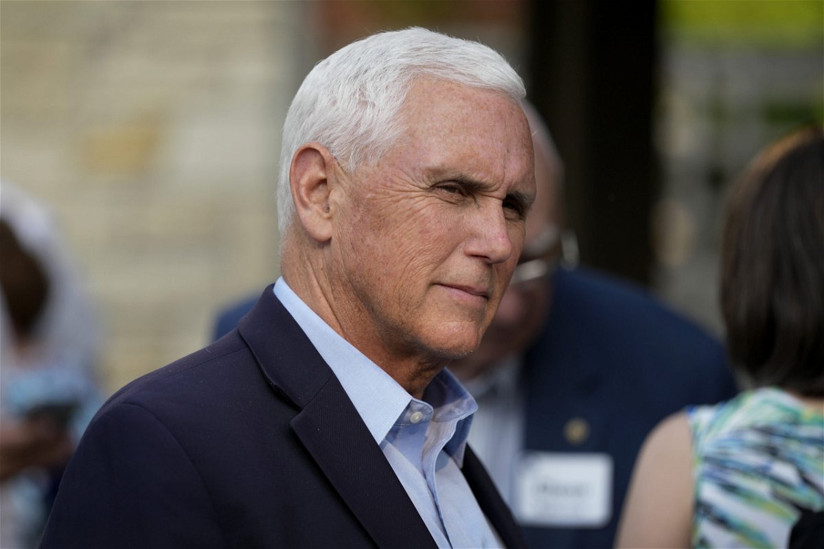 FILE - Former Vice President Mike Pence talks with local residents during a meet and greet on May 23, 2023, in Des Moines, Iowa. Pence will officially launch his widely expected campaign for the Republican nomination for president in Iowa on June 7. 