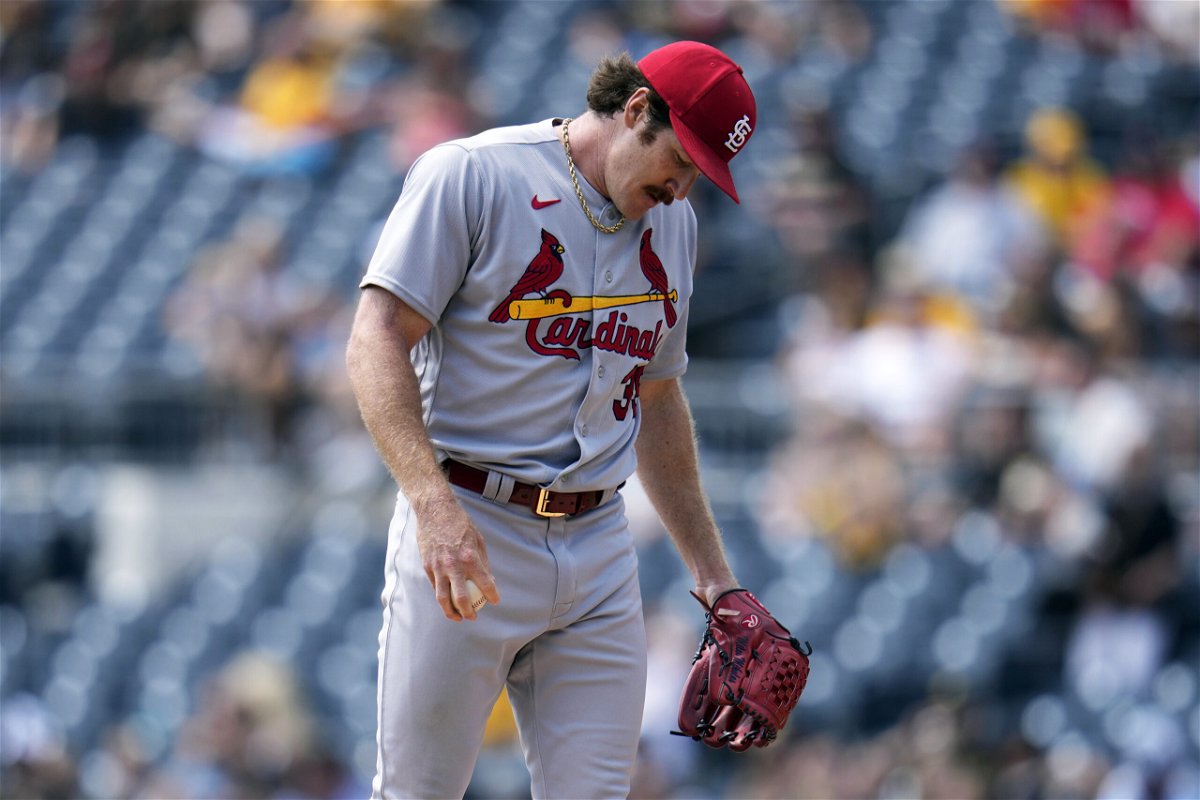 St. Louis Cardinals starting pitcher Miles Mikolas collects himself after allowing two runs to score on a single by Pittsburgh Pirates' Ji Hwan Bae during the first inning of a baseball game in Pittsburgh, Sunday, June 4, 2023. 