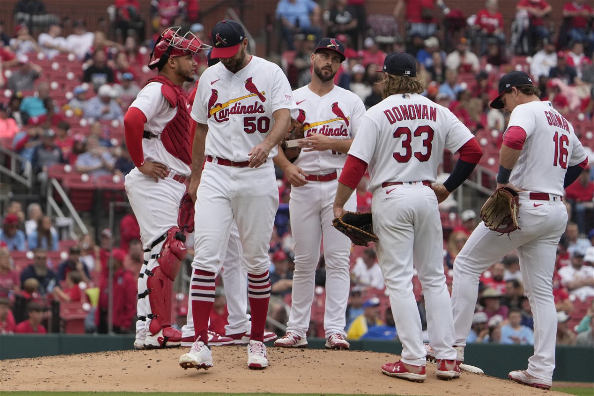 St. Louis Cardinals starting pitcher Adam Wainwright (50) is removed during the sixth inning of a baseball game against the Cincinnati Reds Sunday, June 11, 2023, in St. Louis. (AP Photo/Jeff Roberson)