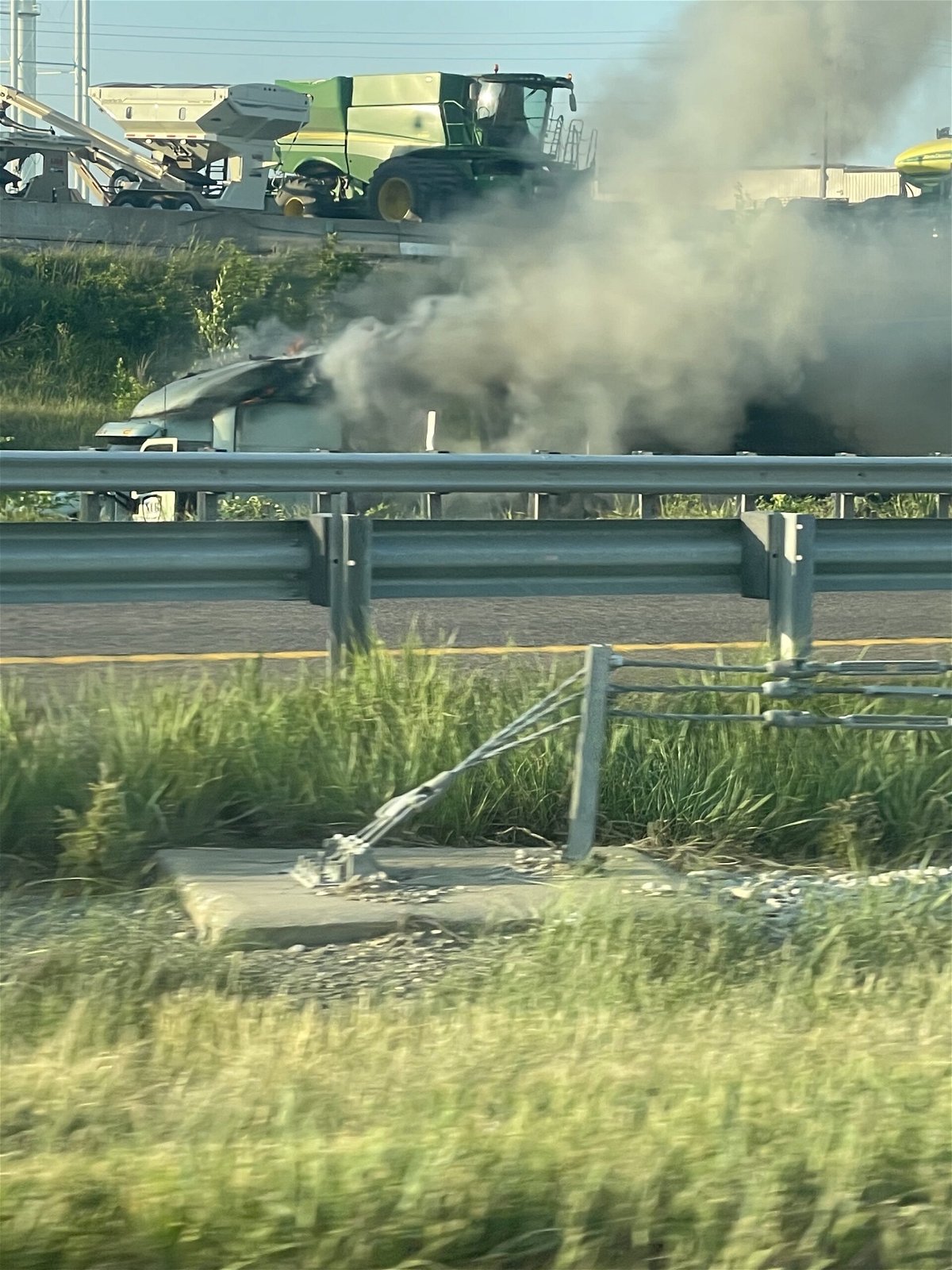 Heavy smoke could be seen coming from a tractor trailer that caught fire Monday evening off at the Interstate 70 off ramp to Route J in Boone County.