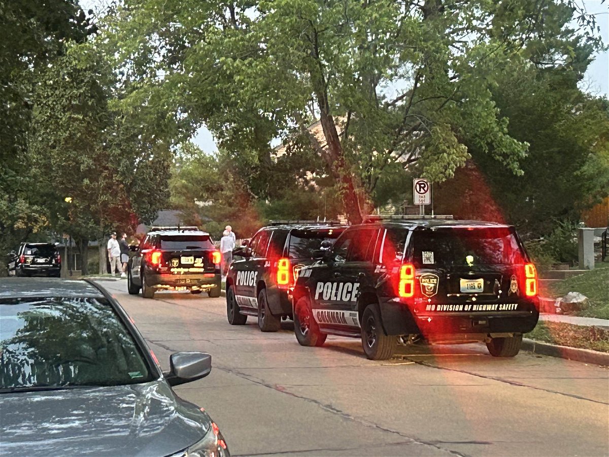 Four Columbia Police Department vehicles are seen Wednesday night in the 600 block of Huntridge Drive.