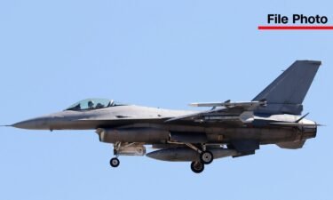 A General Dynamics F-16 Fighting Falcon fighter jet flies at Nellis AFB near Las Vegas