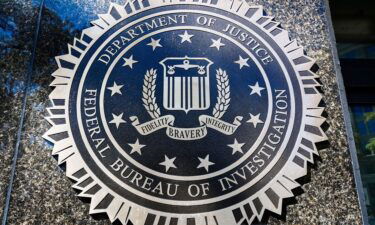 FBI emblem is seen on the headquarters building in Washington DC on October 20