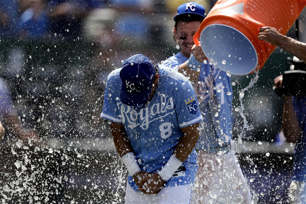 Kansas City Royals' Nicky Lopez is doused by teammates after their baseball game against the Los Angeles Dodgers Sunday, July 2, 2023, in Kansas City, Mo. The Royals won 9-1. (AP Photo/Charlie Riedel)