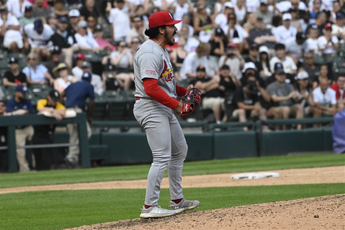 St. Louis Cardinals relief pitcher JoJo Romero (59) yells at the end of the team's baseball game against the Chicago White Sox, Sunday, July 9, 2023, in Chicago.