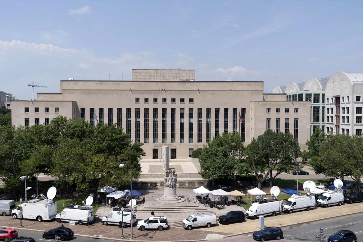 Television news crews set up outside federal court in Washington, on Thursday, July 27, 2023, where a grand jury has been meeting in the probe led by special counsel Jack Smith against former President Donald Trump.
