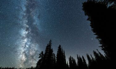 The Delta Aquariids meteor shower and the Milky Way can be seen over the Gifford Pinchot National Forest near Mount Adams in Washington state.