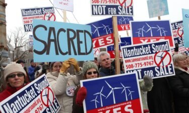 Supporters and opponents of the Cape Wind project protested outside the US Coastguard Station in Woodshole