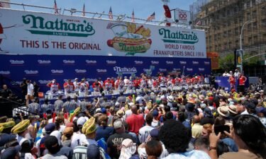 Competitors chow down during Nathan's Famous International Hot Dog Eating Contest on July 4