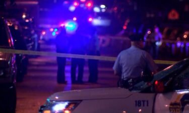 Police gathered Monday night at a shooting scene in southwestern Philadelphia.