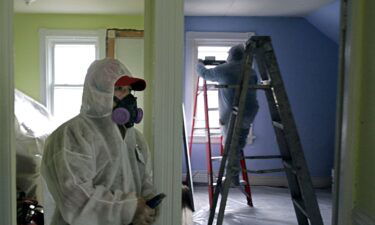 Contractors clean up lead paint at a contaminated building in Providence