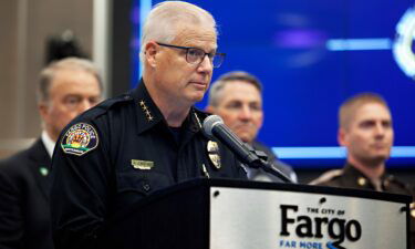 Fargo Police Chief Dave Zibolski pauses during a news conference regarding Friday's shooting in Fargo