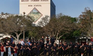Marjory Stoneman Douglas High School students and staff return to school greeted by police and well wishers February 28
