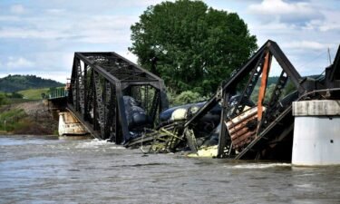 Several train cars fell in the Yellowstone River after a bridge collapse near Columbus on Saturday
