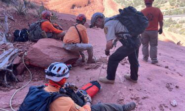 A search and rescue team works to recover the body of a 38-year-old hiker after he suffered a fatal fall while hiking Bell Rock Butte near Sedona