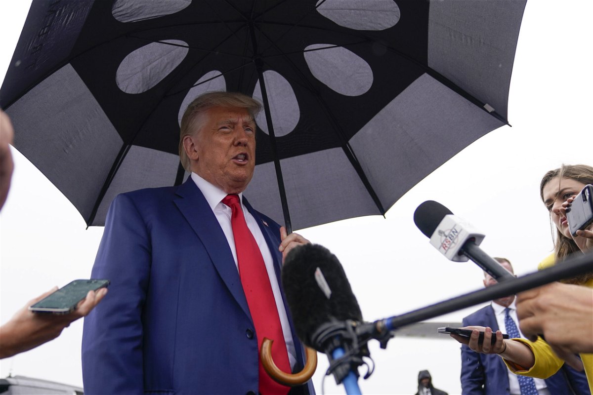 Former President Donald Trump speaks before he boards his plane at Ronald Reagan Washington National Airport, Thursday, Aug. 3, 2023, in Arlington, Va., after facing a judge on federal conspiracy charges that allege he conspired to subvert the 2020 election. 