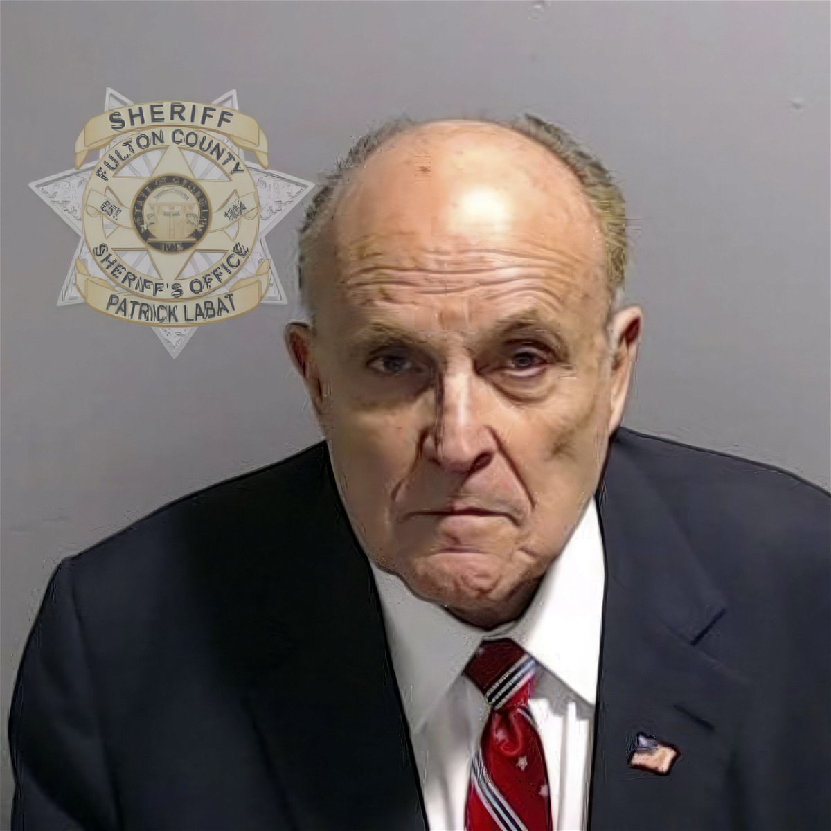 This booking photo provided by the Fulton County Sheriff's Office shows Rudy Giuliani on Wednesday, Aug. 23, 2023, in Atlanta, after he surrendered and was booked. Giuliani is charged alongside former President Donald Trump and 17 others, who are accused by Fulton County District Attorney Fani Willis of scheming to subvert the will of Georgia voters to keep the Republican president in the White House after he lost to Democrat Joe Biden.
