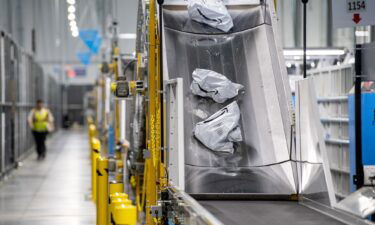 Packages are seen here on a conveyer belt at an Amazon fulfillment center on Prime Day in Melville