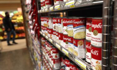 Cans of Campbell's Soup are displayed on a shelf at Scotty's Market on December 8