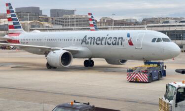American Airlines is fined for keeping passengers waiting on board airplanes during hours-long delays.