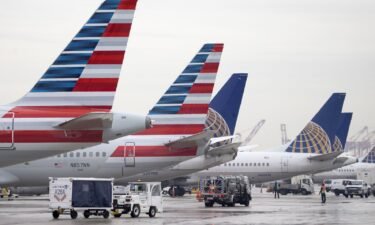 American Airlines and United Airlines airplanes wait at Newark Liberty International Airport's Terminal A in New Jersey.