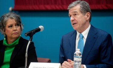 North Carolina Gov. Roy Cooper speaks at a roundtable discussion at Asheville-Buncombe Technical Community College on June 30.
