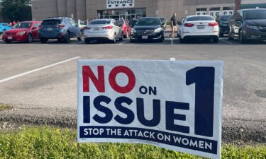 A sign urging voters to vote "no" on Issue 1 stands on the outskirts of a parking lot in front of the Franklin County Board of Elections in Columbus on August 3.