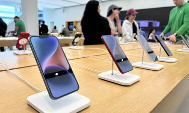 Apple phones are seen here on display in an Apple store on May 4 in Miami