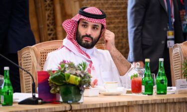 Crown Prince Mohammed bin Salman of Saudi Arabia takes his seat ahead of a working lunch at the G20 Summit on November 15