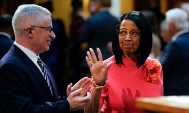 Lt. Gov. Sheila Oliver waves at the New Jersey Statehouse on Tuesday