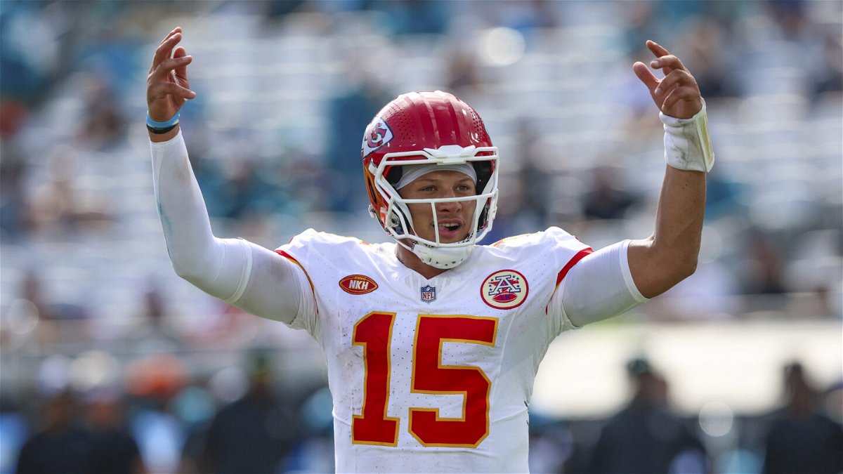 Kansas City Chiefs quarterback Patrick Mahomes (15) encourages fans during the last moments of an NFL football game against the Jacksonville Jaguars, Sunday, Sept. 17, 2023, in Jacksonville, Fla. The Chiefs defeated the Jaguars 17-9. 