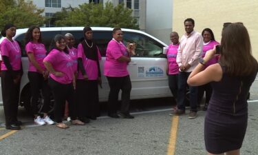 The group's all-women team known as the "Divas" sport their signature pearls as they take passengers to and from their jobs.