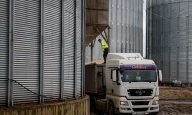 A truck with corn is seen at a grain storage facility in the village of Bilohiria